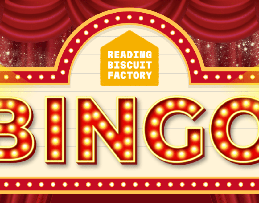 Red theatre curtains in background. Stage lights projecting onto lit up text reading "BINGO" in a retro Broadway light style. Logo of Reading Biscuit Factory.