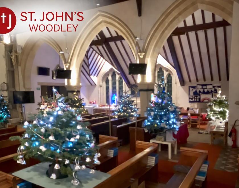 Decorated Christmas trees inside a church