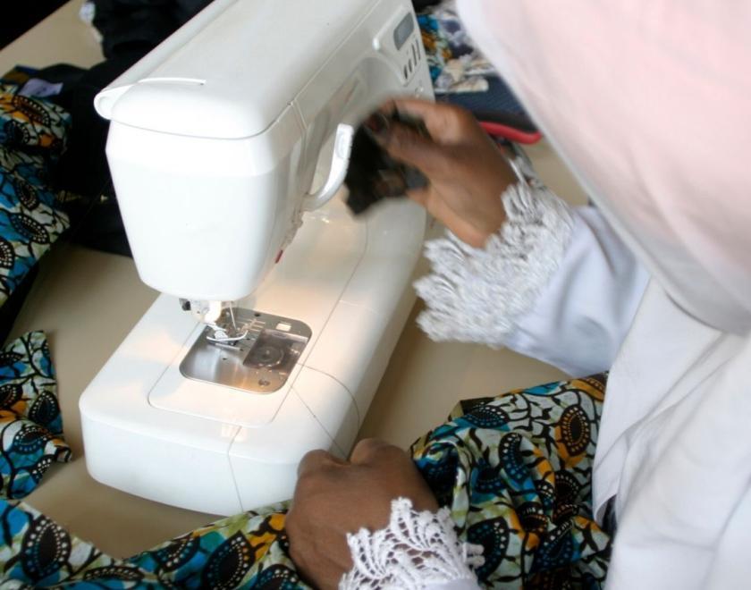 Learner using the sewing machine