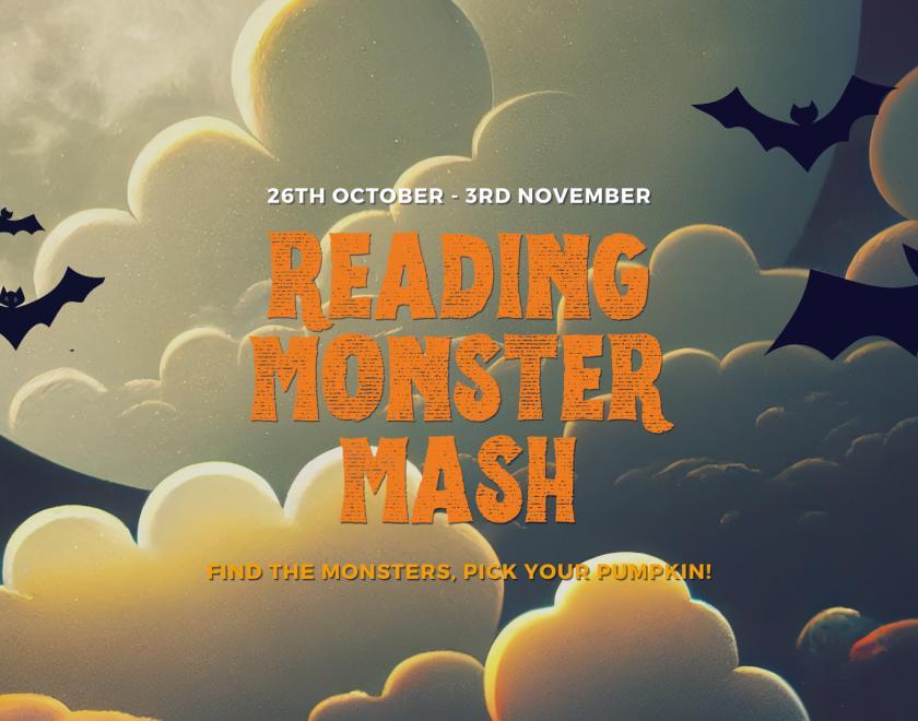 Reading Monster Mash logo in orange text with cartoon images of bats flying against a moonlit background