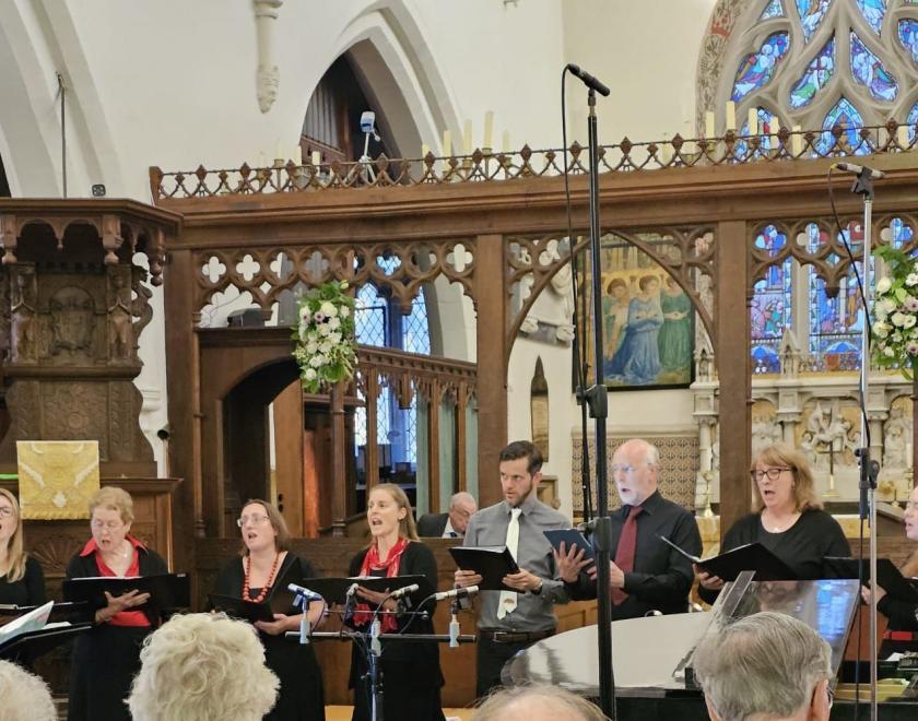 Chorate Chamber choir performing in a church