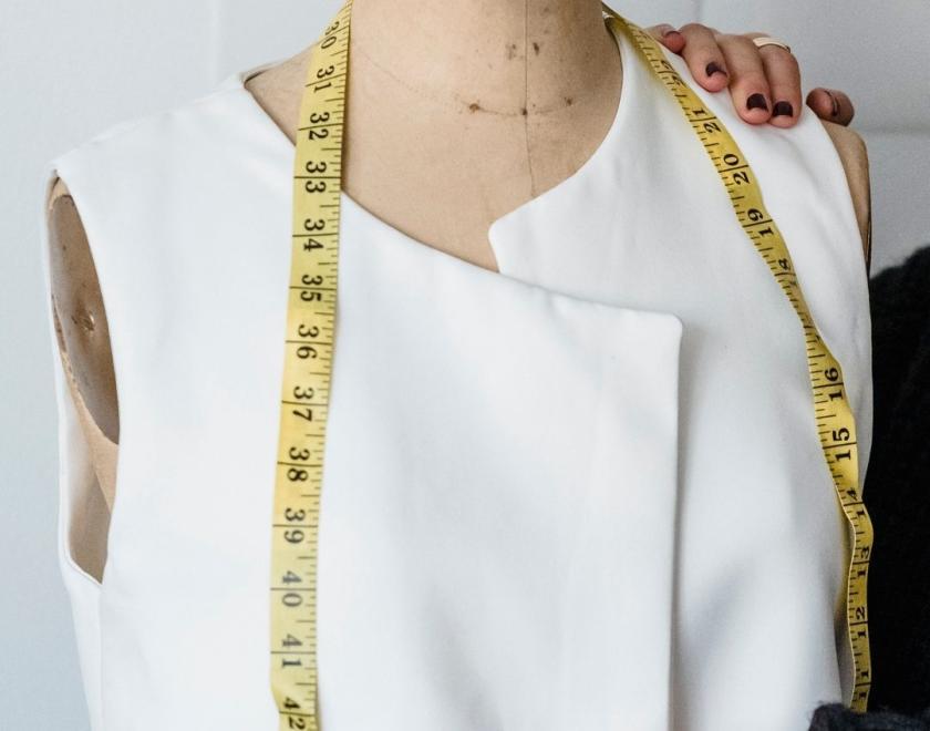 Mannequin with tape measurer around the neck