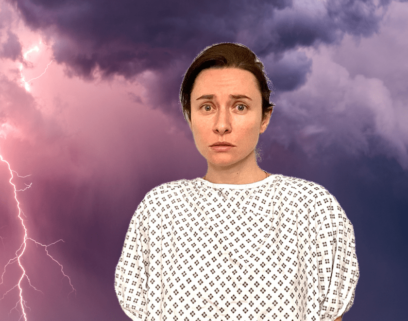 A women looks ahead, wearing a hospital gown with a sad look on her face. Behind her are purple storm clouds and a flash of lightning.