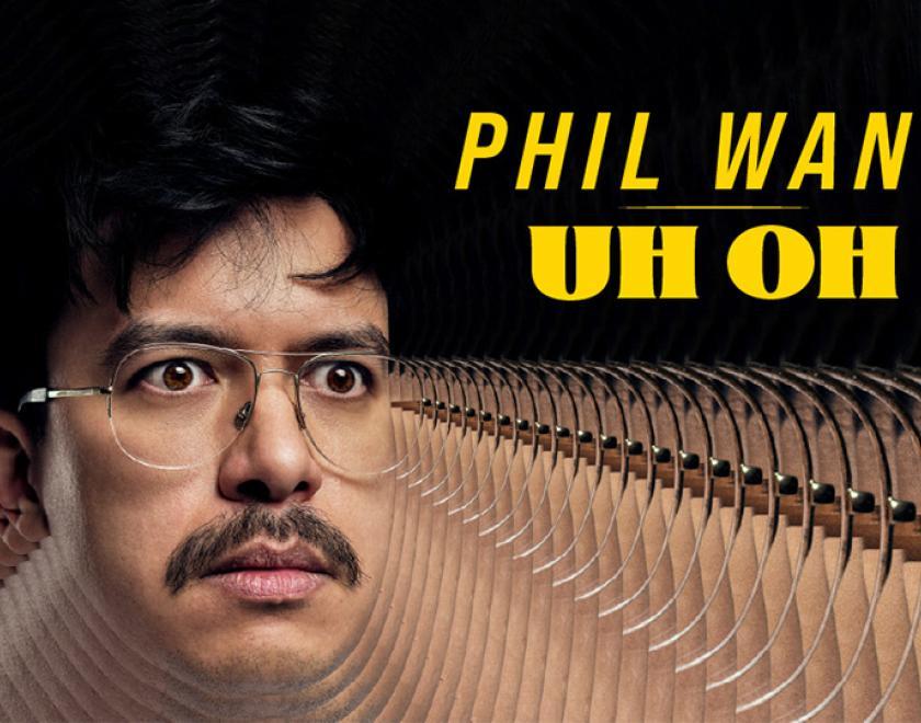 Photo of comedian Phil Wang's face, with a digital effect on the edges so it looks like the camera is zooming in very fast. Yellow text overlaid onto the image reads 'Phil Wang Uh Oh'.