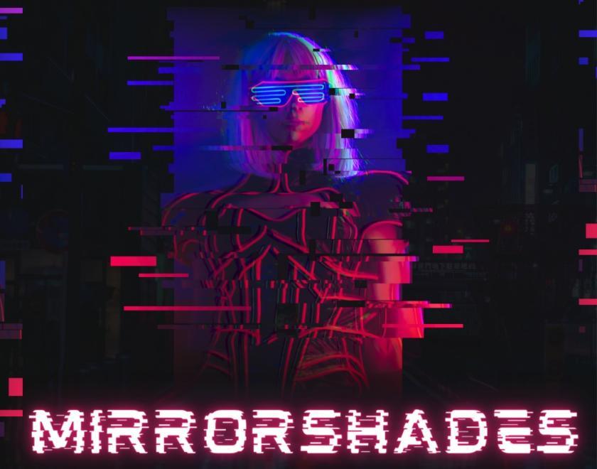 Poster for mega game "Mirrorshades" with the title in a cyberpunk-esque font and an illustration of a woman in mirrored sunglasses that appears to be "glitching" as if in cyberspace