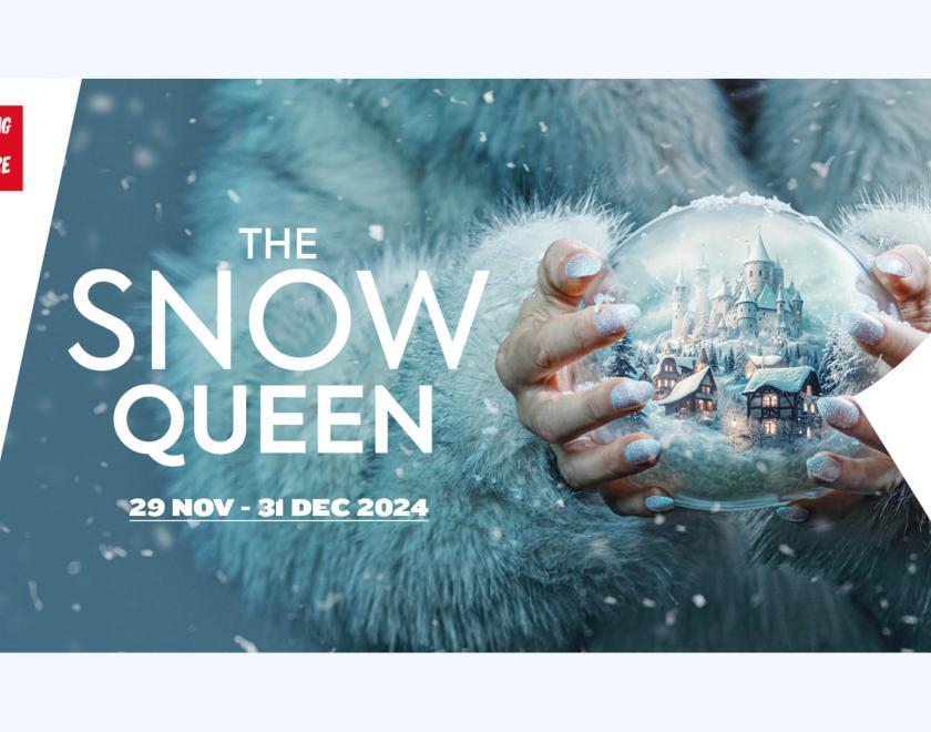 Artwork for The Snow Queen featuring hands holding a snow globe with the logo over the top