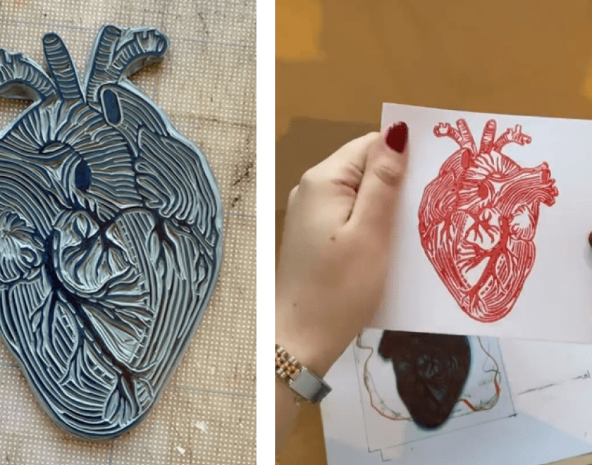 Two images side by side. The left image pictures a carved lino print block in the shape of an anatomical heart. The right image pictures a woman's hands holding a piece of paper with a lino print image of an anatomical heart in red ink.