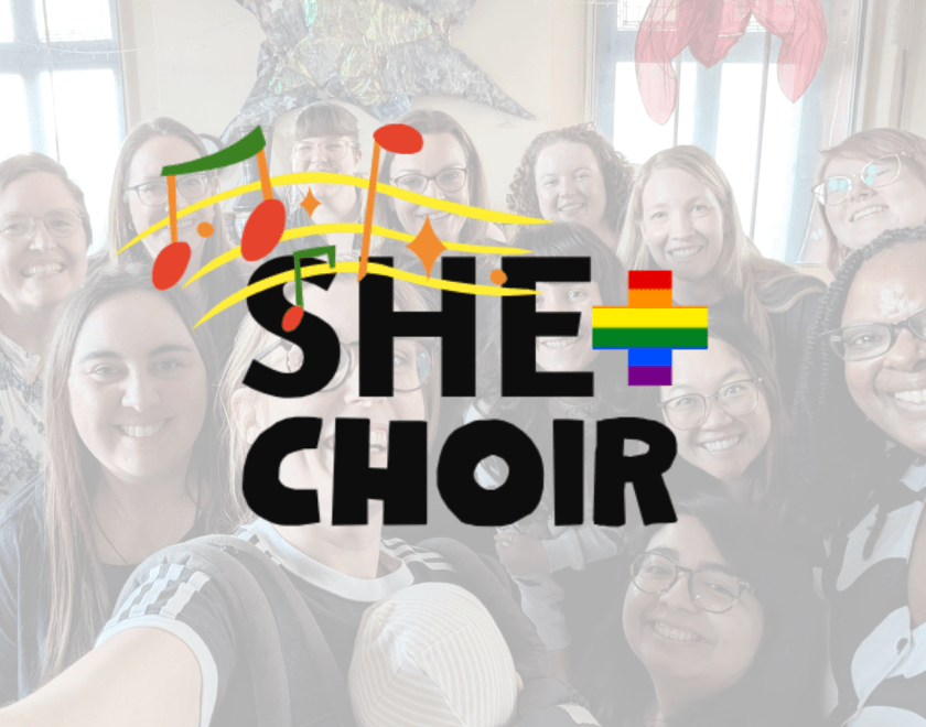 People smiling at the camera with a She+Choir logo overlaid on top