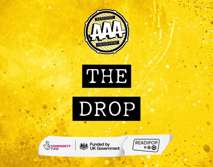 Yellow background with text "The Drop"