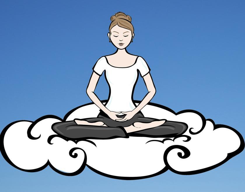 Meditating woman on a cloud