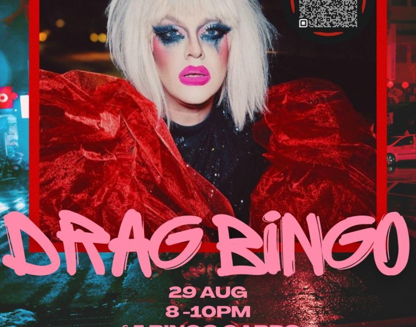 photo of drag queen dame jane wearing a red jacket, with information about the event surrounding her 