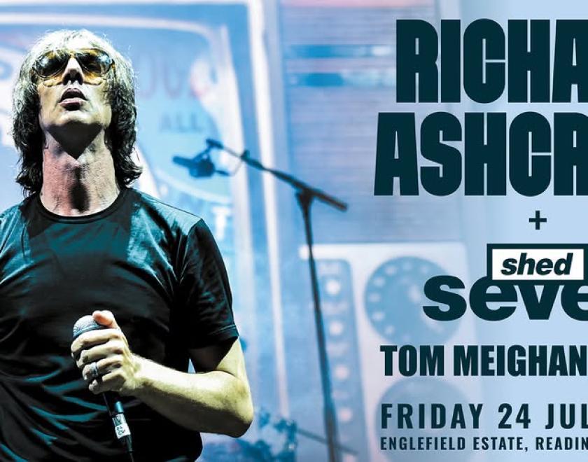 Poster featuring singer Richard Ashcroft wearing sunglasses and a green t-shirt, holding a microphone