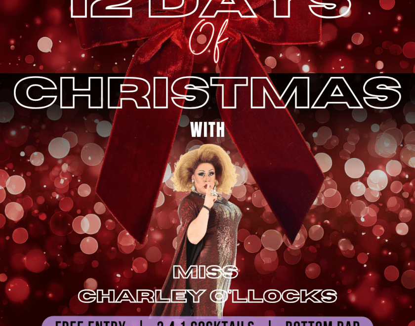 Drag queen Miss Charley O'llocks in front of a sparkly Christmas background