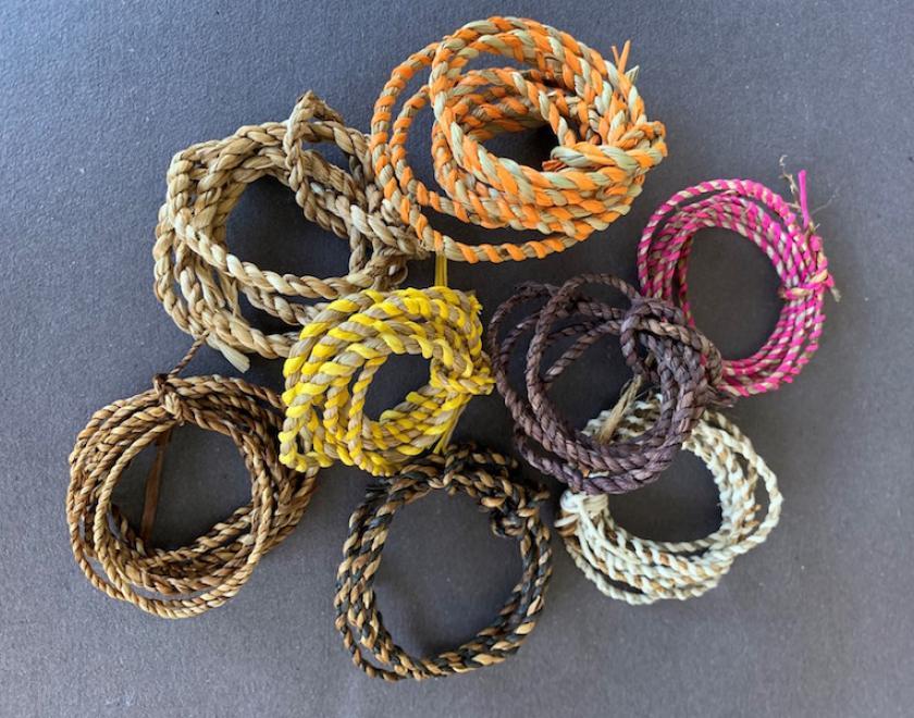 Colourful rolled up pieces of cord