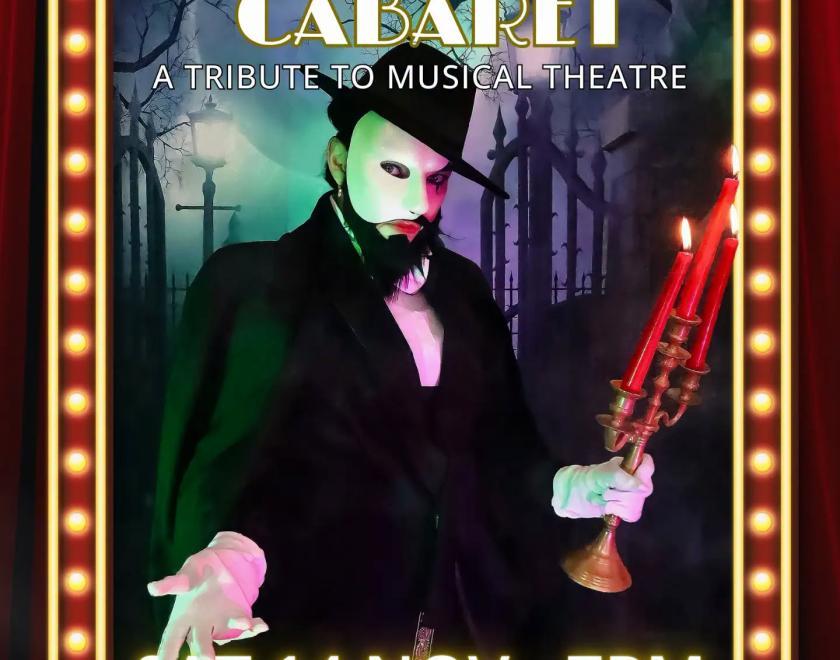 Event poster with a performer dressed as the Phantom of the Opera with the famous white mask, with the poster design inspired by the lightbulb-bordered theatrical mirror