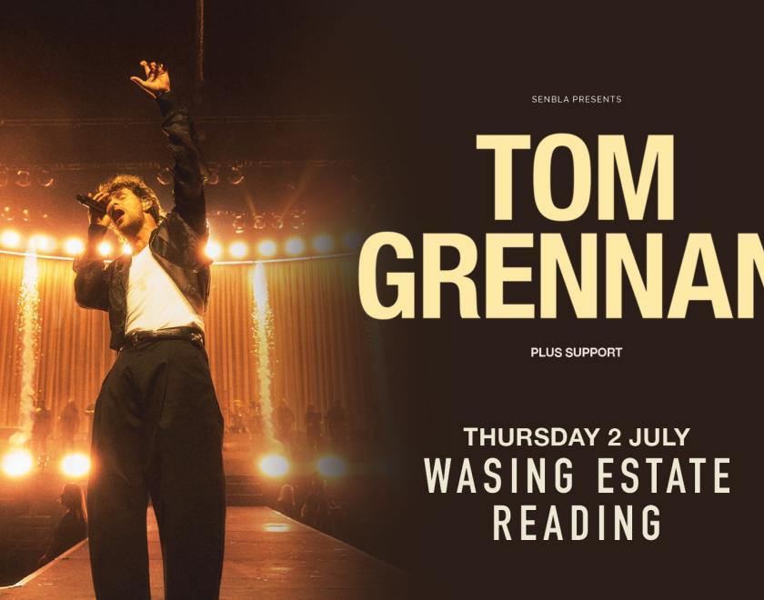 Event poster with an image of singer Tom Grennan on stage with his fist in the air