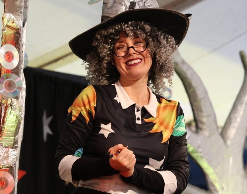 A woman in a witch costume