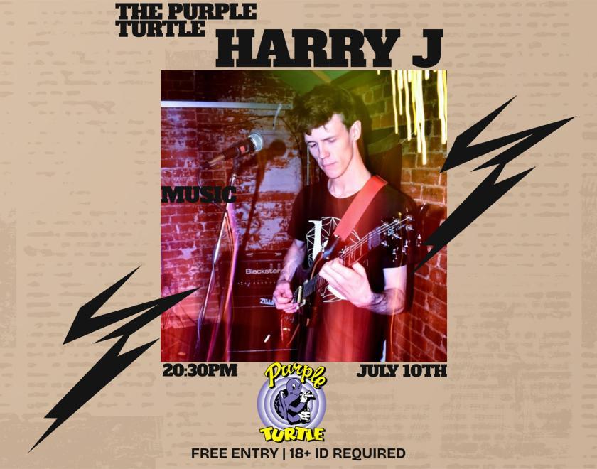 Poster with photo of Harry J on stage playing guitar