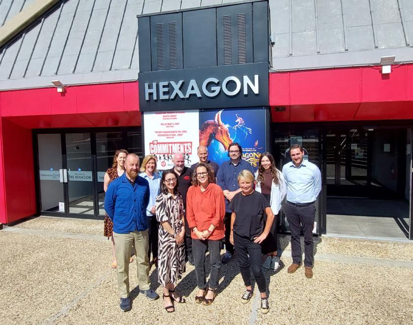 Staff outside the Hexagon Theatre