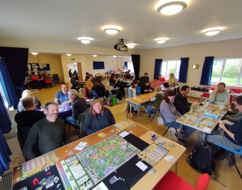 people playing board games