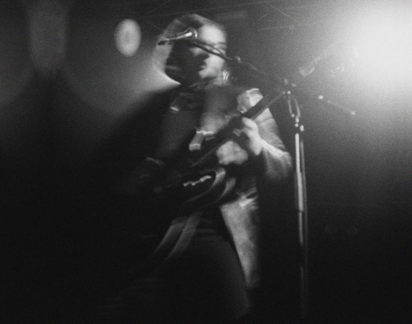 a black and white image of the band