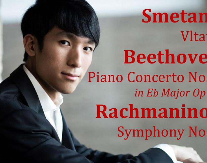 pianist Eric Lu in a black suit and white shirt