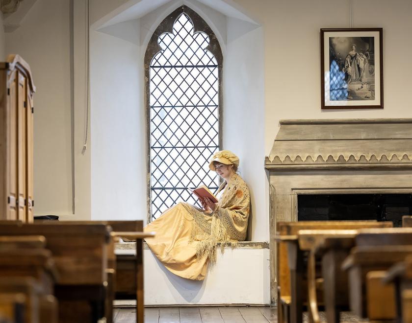 Jane Austen Costume Interpreter in the ABbey Gateway