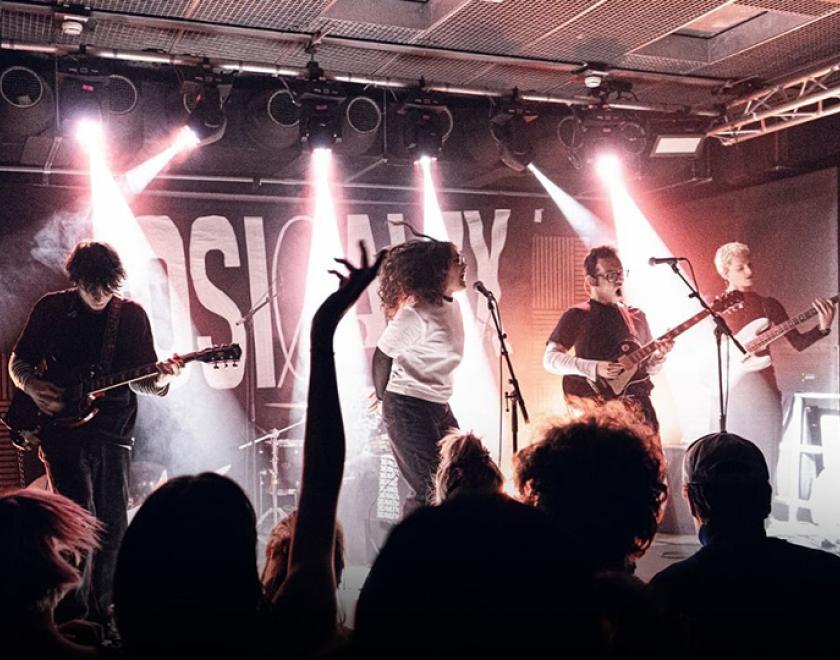 The band Josi & Alex performing on stage