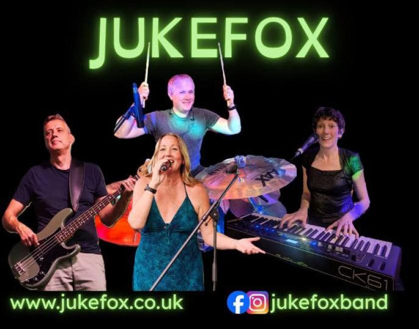 Members of the band Jukefox, all playing their respective instruments
