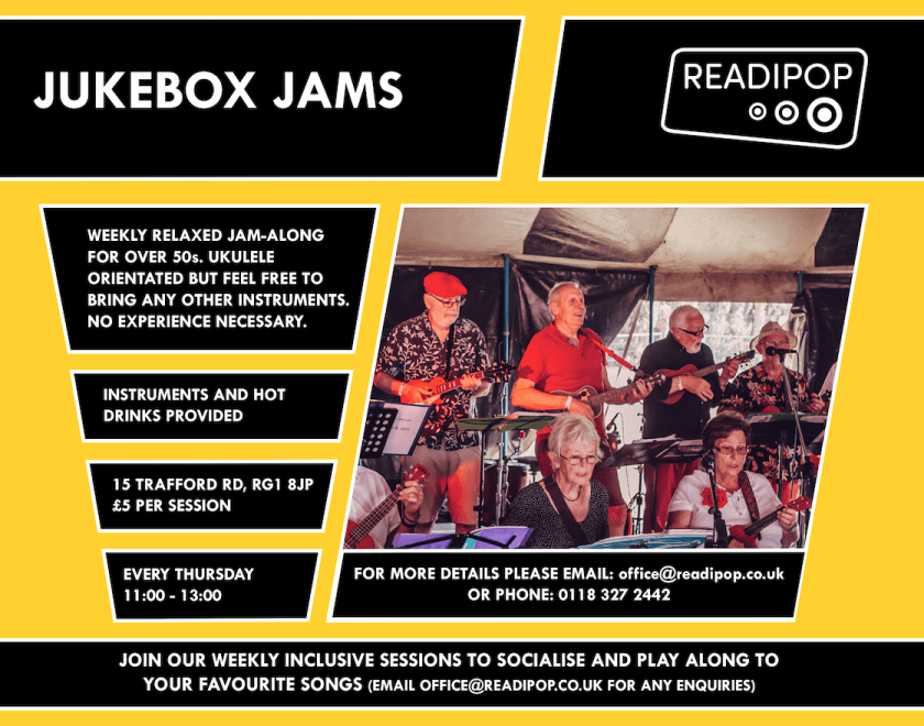 Banner containing information (as seen below) and members of Jukebox Jams performing at Readipop Festival