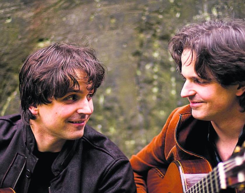 Identical twins Peter and Zoltan Katona, two Spanish men with dark hair