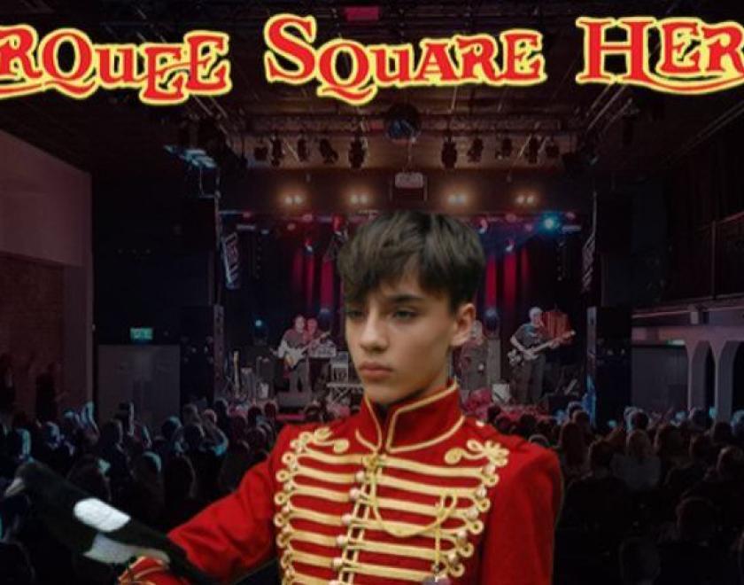 A child in a drummers outfit over an image of the band on stage