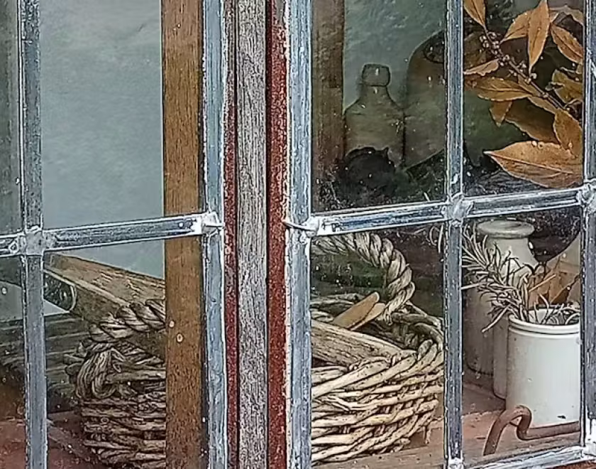 Window looking into a cottage