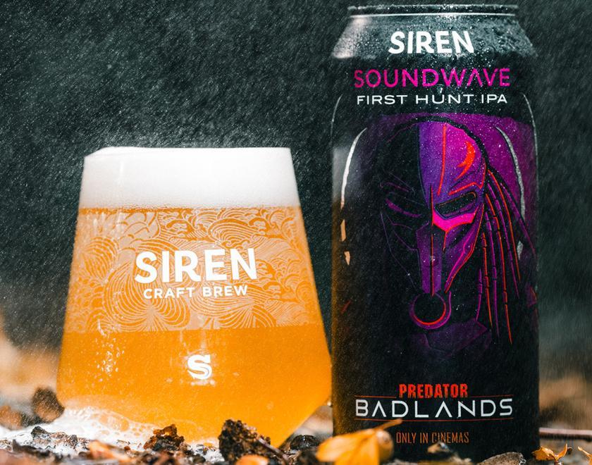 A can of Soundwave: First Hunt next to a glass of the same beer