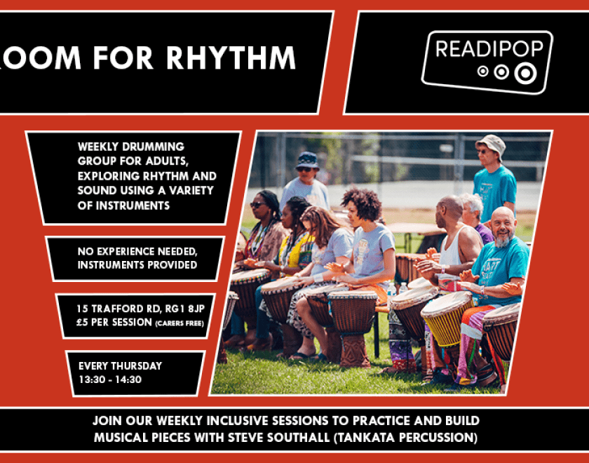 People drumming in the sun, information (as seen below) regarding the event.