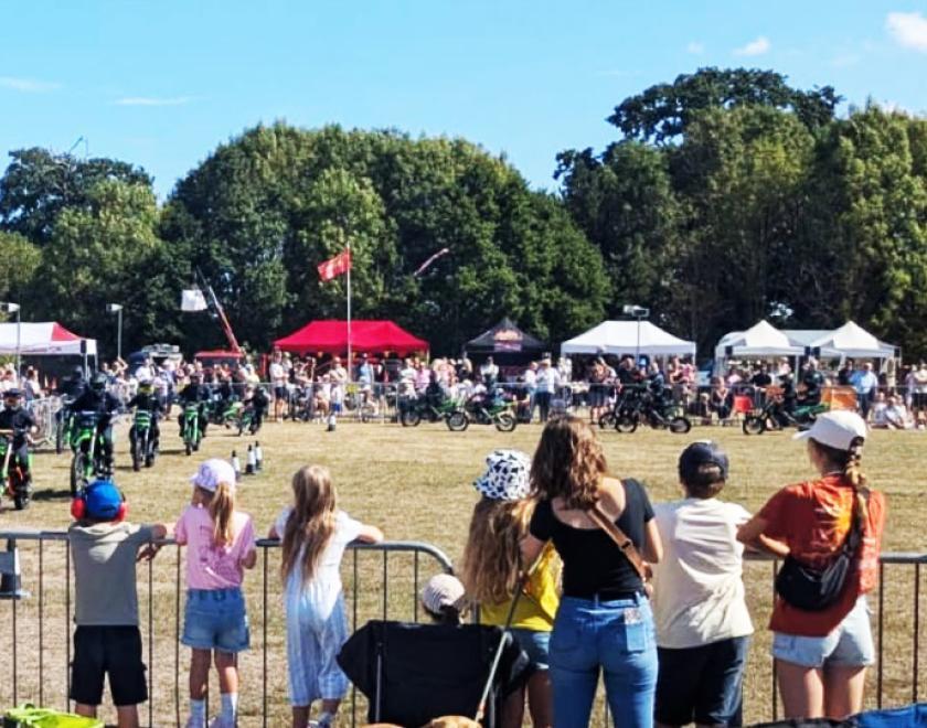 Motorcycles in the arena at the Swallowfield Show