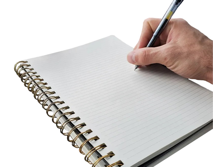Image of a hand holding a pen over a blank writing pad